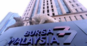 Bursa Malaysia lower at midday