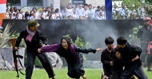 Cambodian students re-enact bloody Khmer Rouge crimes