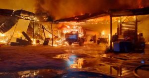 Early morning fire destroys timber mill, workers' quarters and vehicles