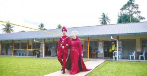 Newlywed couple adds colour to voting day