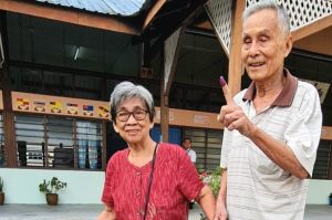 Octogenarian couple returns to Tapah to vote in Ayer Kuning by-election
