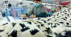 China says 'door open' to trade talks after Trump signals tariffs will fall