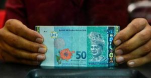 Ringgit opens easier as market anticipates softer US tariff stance
